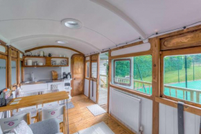 Railway Carriage accommodation with tennis court!